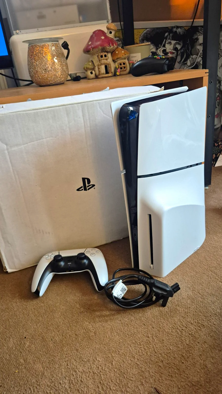 PlayStation 5 Slim Disc Edition console and controller